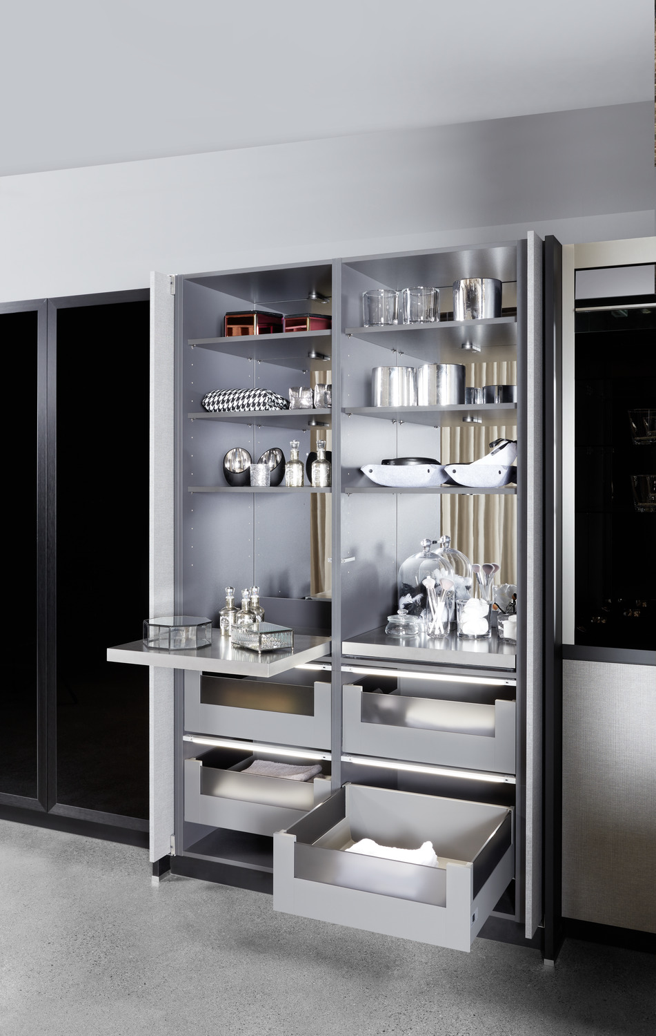 Kitchen tall unit with pocket doors open