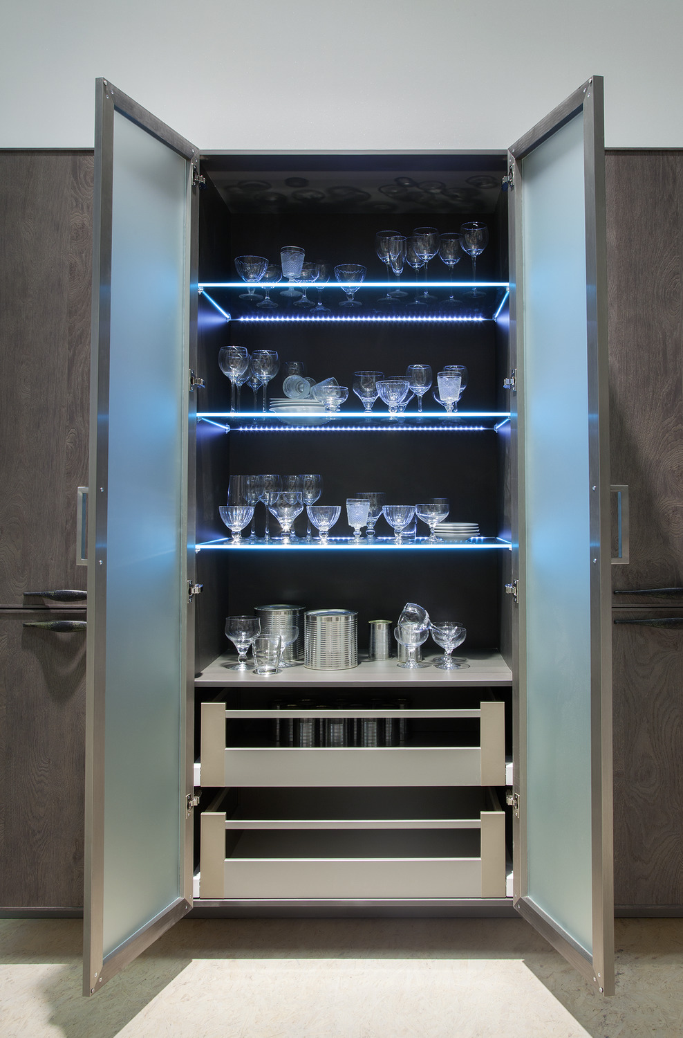 Glass tall boy unit with single door